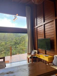 TV a/nebo společenská místnost v ubytování Sítio Rancho Mineiro