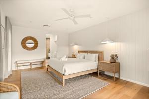 Postel nebo postele na pokoji v ubytování Peaceful 4BR Bonogin Retreat by Housemark Escapes + 72 fotografií