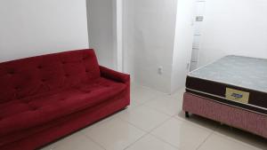 Posezení v ubytování Kitnet em São Brás