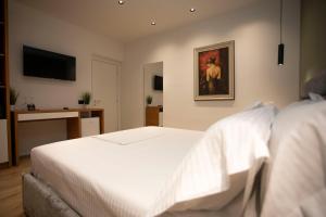 Μια τηλεόραση ή/και κέντρο ψυχαγωγίας στο Vila Claus Hotel