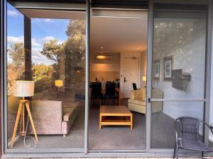 Posezení v ubytování Resort Living with Pool, Golf, Bar and Dining