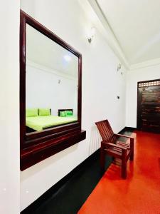 Postel nebo postele na pokoji v ubytování Jasmine Garden & Resort