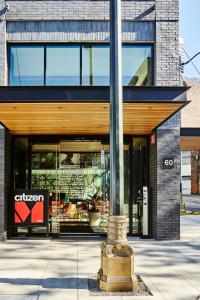 a store front of a building with a sign in it at citizenM Seattle Pioneer Square in Seattle