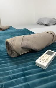 Ένα ή περισσότερα κρεβάτια σε δωμάτιο στο Beira mar incrivel na praia de pajuçara pertinho da roda gigante +30 φωτογραφίες