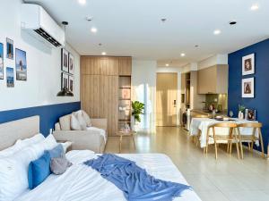 Una cama o camas en una habitación de CĂN HỘ NGHĨ DƯỠNG CAO CẤP THE SONG VŨNG TÀU-THE SONG APARTMENT Mr VƯƠNG 69 fotos más