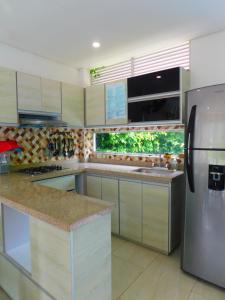 Kuchyň nebo kuchyňský kout v ubytování Casa Vacacional - Portales del Sol 1