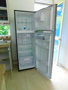 Kuchyň nebo kuchyňský kout v ubytování Casa Vacacional - Portales del Sol 1