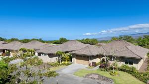 an aerial view of a row of houses at SAND CASTLE Modern KaMilo 4BR Home with Ocean Views Bikes in Waikoloa