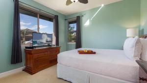 Postel nebo postele na pokoji v ubytování PARADISE FOUND VILLA Paradise Found 2BR at Kulalani with Private Beach Club + 41 fotografií