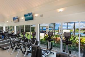 een sportschool met loopbanden en crosstrainers bij Mauna Kea Magic ~ Private Pool Spa Detached Ohana Suite in Waimea