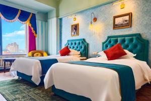 Postel nebo postele na pokoji v ubytování Friendship Hotel, Manzhouli