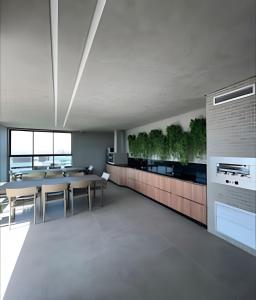 a kitchen and dining room with a table and chairs at Apt sensacional Liv Residence pertinho da praia ! in Maceió +57 photos