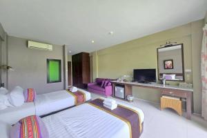 TV a/nebo společenská místnost v ubytování Poonyamantra Resort Chiang Rai