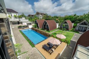 an aerial view of a villa with a swimming pool at Twin Room with Kitchen & Pool in Uluwatu - No 4 in Bingin Beach