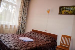 Un pat sau paturi într-o cameră la Filvarki-Centre