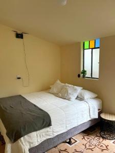 Ένα ή περισσότερα κρεβάτια σε δωμάτιο στο Residencia Aren 2