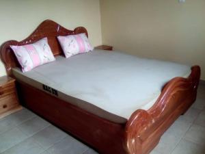 Postel nebo postele na pokoji v ubytování Studio moderne Liboudi Nkolbisson Yaoundé