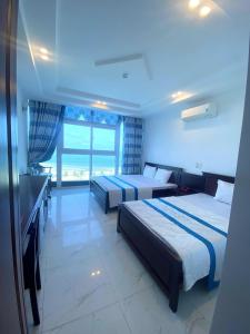 Ένα ή περισσότερα κρεβάτια σε δωμάτιο στο Khu Nghỉ Dưỡng Đoàn 298 - Khách Sạn 3 Tầng