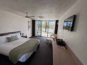 Postel nebo postele na pokoji v ubytování Brunswick River Inn + 32 fotografií