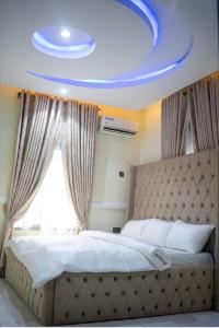 Ένα ή περισσότερα κρεβάτια σε δωμάτιο στο Aniyah Home