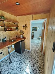 a kitchen with a sink and a counter top at Maungatapu Hut in Rai Falls
