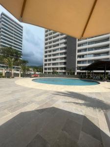 La alberca dentro o cerca de Apartamento cerca al mar santa Marta- santamarina-614