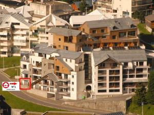 an aerial view of buildings in a city at Studio à Gourette, 6 pers, piscine et animaux admis - FR-1-860-35 in Gourette