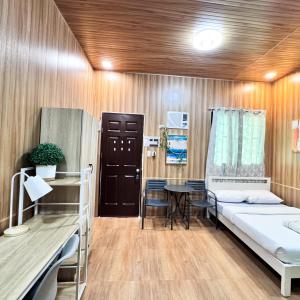 Postel nebo postele na pokoji v ubytování Malaybalay Air’bnb Travellers Inn + 82 fotografií