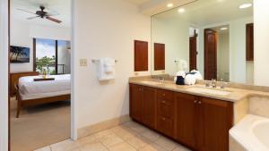 Ένα ή περισσότερα κρεβάτια σε δωμάτιο στο OCEAN POINT Elegant 2BR Mauna Lani Point Home with Golf View +52 φωτογραφίες