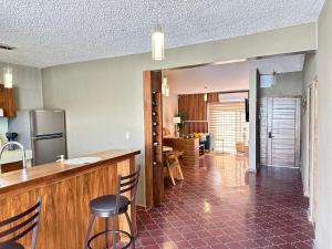 Kuchyň nebo kuchyňský kout v ubytování Mi Casa Tu Casa