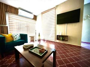 TV a/nebo společenská místnost v ubytování Mi Casa Tu Casa