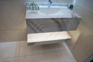 a white sink in a bathroom with a counter at Modern and spacious luxury villa for rent 2 bedrooms in Nouakchott +21 photos