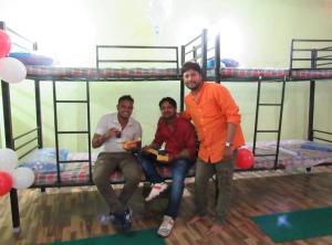 Postel nebo postele na pokoji v ubytování Shantinivaas