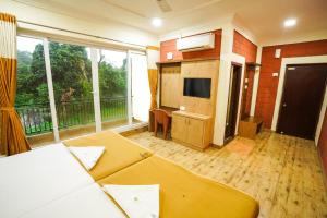 Μια τηλεόραση ή/και κέντρο ψυχαγωγίας στο PARIJATHA INN