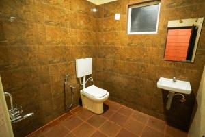 Ένα μπάνιο στο PARIJATHA INN +15 φωτογραφίες