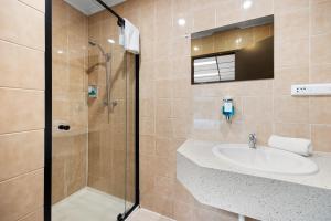 Koupelna v ubytování Cosmo on Bank + 34 fotografií