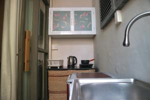 Kuchyň nebo kuchyňský kout v ubytování Yên Art Homestay + 16 fotografií