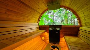 a small room with a window in a sauna at Kaze no Tani no Iori in Gamagori +58 photos