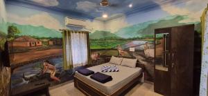 Postel nebo postele na pokoji v ubytování Aabhai Beach Resort + 19 fotografií