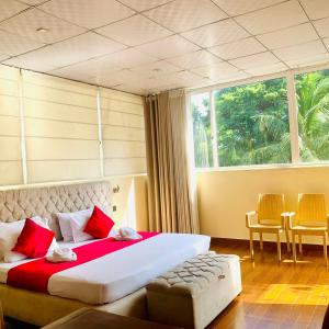 Postel nebo postele na pokoji v ubytování Royal Retreat ,Kandy