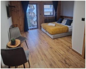 Ένα ή περισσότερα κρεβάτια σε δωμάτιο στο Sądelska Chałpa