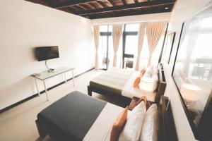 TV a/nebo společenská místnost v ubytování San Juan Surf Resort La Union