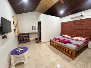 Imagen de la galería de Brahmand cottages, en Dapoli