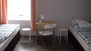 Posteľ alebo postele v izbe v ubytovaní Hostel Kamienna Centrum