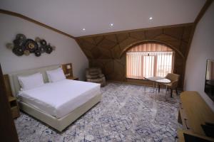 Ένα ή περισσότερα κρεβάτια σε δωμάτιο στο Hotel Elegant +15 φωτογραφίες