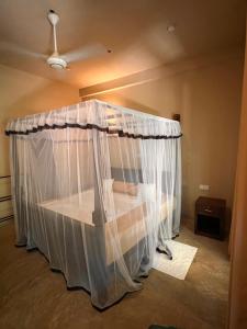 Ένα ή περισσότερα κρεβάτια σε δωμάτιο στο Bamboo Grove Villa