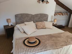 Postel nebo postele na pokoji v ubytování Le Clos des Pigières Gîte le Grènetier