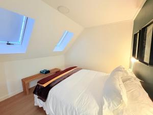 Postel nebo postele na pokoji v ubytování The Wild Oak