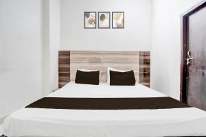 Giường trong phòng chung tại Hotel O Chaudhary Guest House