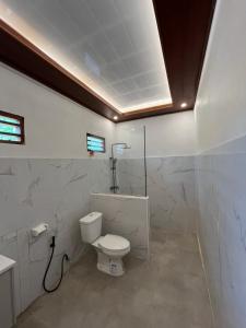 Ένα μπάνιο στο Nata home stay